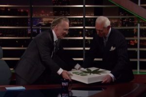 Roger Stone presents a marijuana cake to Bill Maher.